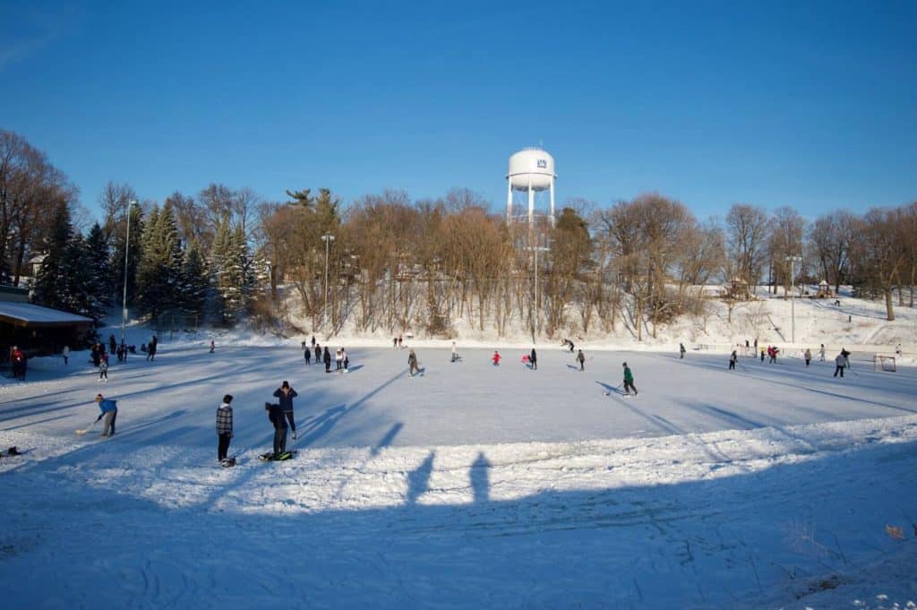 people ice skating at klapprich park, one of wayzata parks 