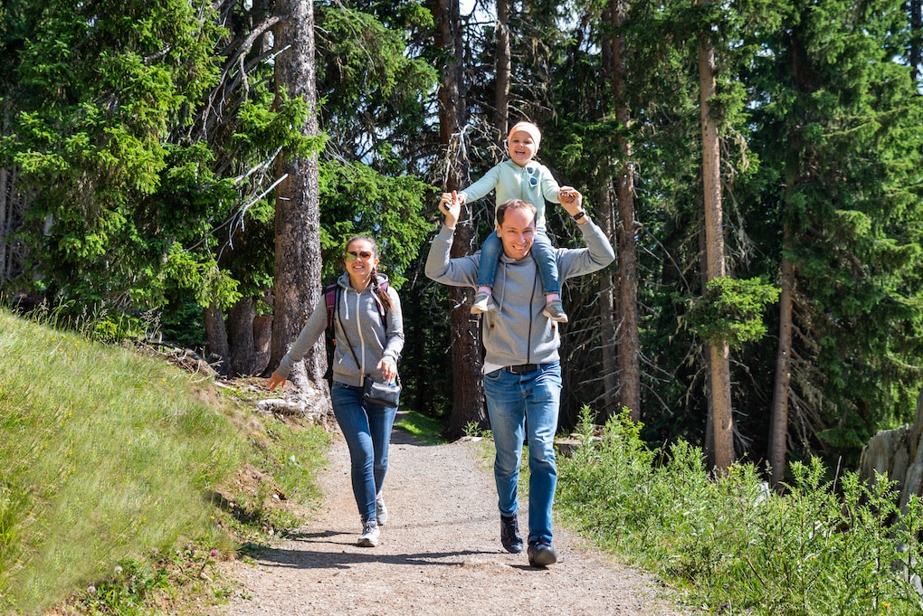 family walking on a wayzata parks trail at big woods preserve